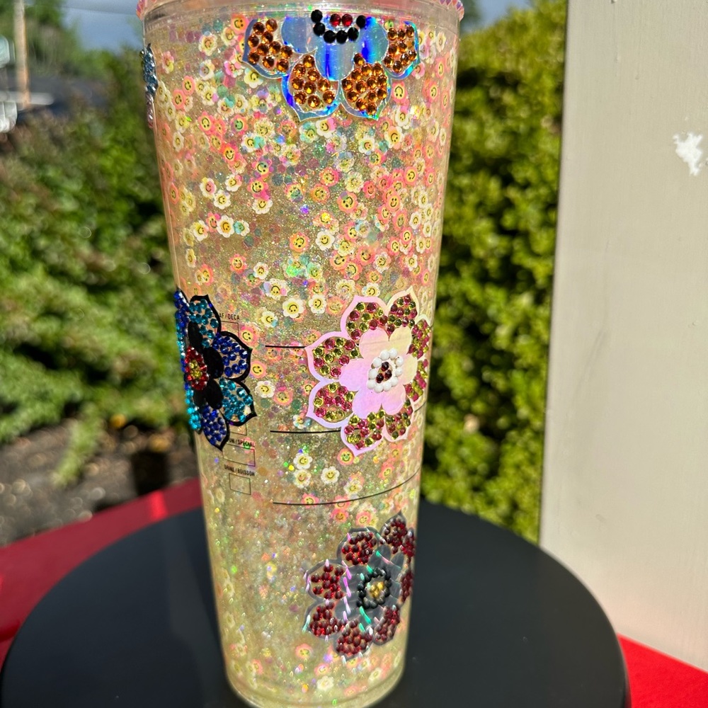 24 oz, Starbucks ”smiling daisies” themed,  snow globe  tumbler, by